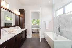 The cost of remodeling a master bathroom is upward of $9,500 while installing a new master bathroom can cost more than twice as much. How Much Does A Bathroom Renovation Increase Home Value Moving Com
