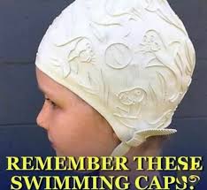 What was the style of swim caps in the early 70's?