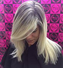 To reach this shade, the hair needs to be lightened to a pale yellow hue first, then toned using a combination of cendre, violet and blue to create a true ash blonde result. 40 Two Tone Hair Styles