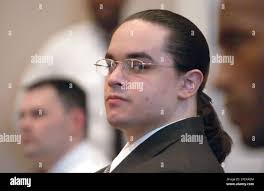 Luis Vasquez, one of four men charged in the November 2001 slaying of Io  Nachtwey, a 22-year-old Cambridge homeless woman, sits in Suffolk County  Superior Court during his trial Friday, March 11,