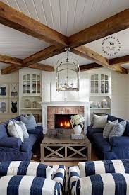 White And Blue Living Room With Beadboard Clad Ceiling Adorned With A Polished Nickel Lantern Pendant Mounted In The C Cottage Living Rooms Home Cottage Living