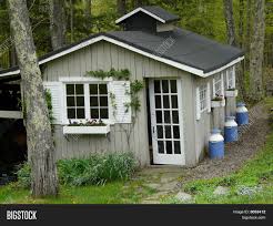 Scopri immagini su {{searchview.params.phrase}} in base alla tonalità di colore. Pretty Garden Shed Image Photo Free Trial Bigstock