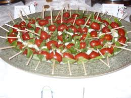 Place the salad in a pretty metal bowl with ice to keep fresh and cold. Insalata Caprese Kebabs