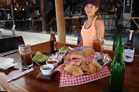 Grilled chicken breast (steak +$1.99), golden flour tortilla crisps, refritos, lettuce, tomato, red onion, cilantro, carrots, corn, cucumber. Cancun Beach Fish Taco 8k Go Running Tours