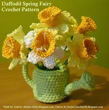 Crocheted Daffodils In Green Watering Can A Photo On Flickriver Crochet Plant Crochet Flower Patterns Crochet Patterns