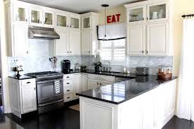 Off White Cabinets Grey Marble Backsplash Black Counters Dark Floors Kitchen Remodel Small Kitchen Design Small Small White Kitchens