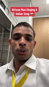 African Man Singing Indian Song
