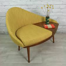 Antique upholstered arm chair with wooden legs and trim. Vintage 1960s Telephone Seat Mid Century Modern Furniture Mid Century Chair Mid Century Furniture