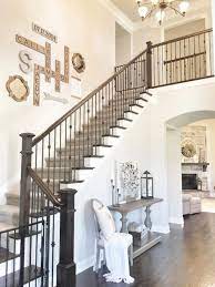 Stairway House A Two Family Home With A Stairway Like Structure And Functional Elements Decorating Stairway Walls Stair Wall Decor Stair Decor