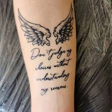 The rib cage is becoming a very popular position for tattoo art. Angel Wing Tattoos With Quotes Novocom Top
