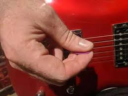 The importance of holding your pick correctly. How To Strum A Guitar With A Pick Midlife Guitar