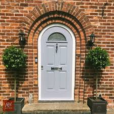 The front door is actually the heart of the front facade of a house. Alexander Windows Solidor Composite Doors Composite Front Door Arched Front Door Modern Front Door