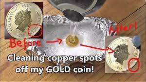 Never rub or wipe dry your gold coins after cleaning them. Cleaning Copper Spots Off My Gold Coin Youtube
