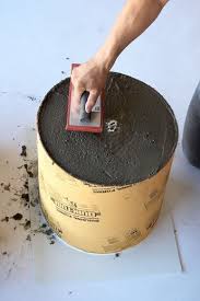 Pour some of the portland cement mix into a shallow container. Weekend Project Make These Large Scale Modern Concrete Planters Diy Concrete Planters Concrete Planters Concrete Diy