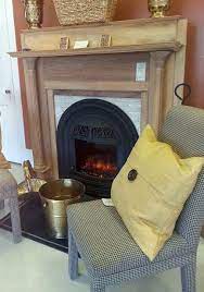 Offering style, warmth and functionality, the piece features triangular media storage shelves enclosed by glass. Windsor Electric Fireplace Or Insert Electric Fireplace Insert Electric Fireplace Fireplace Inserts