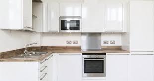 How To Repair Kitchen Cabinet Doors With Particleboard Swelling Ehow Refacing Kitchen Cabinets Laminate Cabinets Kitchen Cabinets