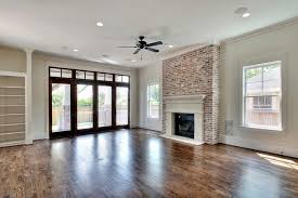 Fireplace Black Ceiling Fan And Whitewashed Fireplace In Craftsman Living Room Desig Recessed Lighting Living Room Craftsman Living Rooms Living Room Lighting