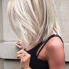 The long hair from the sides covers the. 1