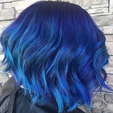 If your hair is not already light, you're definitely going to want to make with a professional hair colorist as going blue can be an intensive process. Dark Purple Hair Dye Unicorn Hair Squid Color Lime Crime