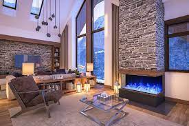 Hier finden sie genau das was sie brauchen mit den besten produkten und preisen Kamin Mitten Im Raum Gestalten Sie Ihr Wohnzimmer Mit Einer Zentral Positionierten Feuer Fireplace Design Stone Fireplace Designs Built In Electric Fireplace