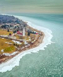 Wind point lighthouse (or windpoint light station) is a lighthouse located at the north end of racine harbor in the u.s. Wind Point Lighthouse Photograph By Randy Kostichka