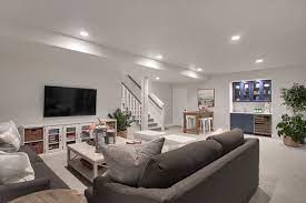 Tv Area Connected To Wet Bar And Flex Space Mackintosh Basement Living Rooms Basement Makeover Finishing Basement