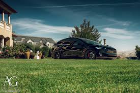The most popular combination for a chrome delete is the high contrast look of white paint and the black chrome delete. Ag Luxury Wheels Tesla Model X Duo Block Forged Wheels