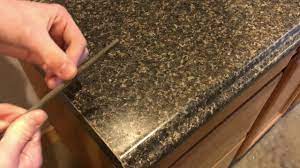 Just like anything else in your home, it if you're wondering how to fix laminate countertops that have experienced water damage, there are a few options for you. How To Finish A Formica Countertop Laminate Edge Youtube