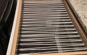 This laundry room drying rack and pipe bar has multiple uses. Original Organization Ideas For Your Laundry Room Hometalk