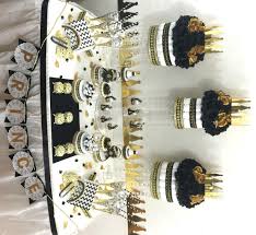 Royal Black And Gold Baby Shower Decorations Black And Gold Baby Shower Candy Buffet Centerpiece With Baby With Images Baby Boy Shower Favors Baby Shower Themes Gold Baby Shower Boy