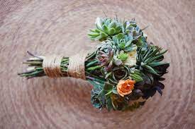 Now, that doesn't mean you need to skip on the things you love—florals, centerpieces, a gorgeous ring, or darling invitation suite—but you can opt for these. Go Green With A Bridal Bouquet Made From Eco Chic Succulents
