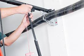 Your current door is damaged. Garage Door Spring Repair Austin Cedar Park Overhead Doors