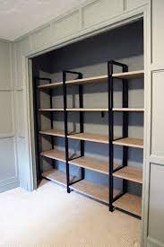 using bookcases in a bedroom closet home office storage shelving beveled glass mirror
