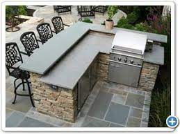 Standard barbecue with flagstone counter tops and stainless steel capital grill. Outdoor Cooking Areas Have Come To Be Very Well Known Of Late Hence Numerous Kinds Of Equipment Have Been Backyard Patio Backyard Kitchen Outdoor Kitchen Bars