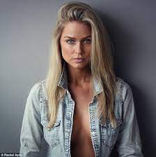 Renae Ayris shows off a hint of cleavage in an open denim shirt | Daily  Mail Online