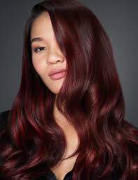 Therefore, it's best to consult a professional hair colourist first, who is trained in matching hair colour to different complexions in a totally flattering way. Glossy Burgundy Red Haircolor Redken