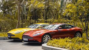 Image result for Sunburst Yellow 2017 Aston Martin