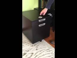 A drinks and display cabinet with a striking gold leaf backing and soft pink mauve exterior. How To Open Locked Ikea Cabinet Youtube