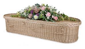 Yellow rose & freesia £135. Wicker Coffins Somerset Willow Coffins