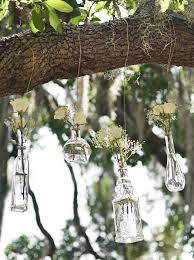Attach individual flower stems to a wall at. Diy Hanging Flower Vases For Backyard Weddings Beacon Lane Blog