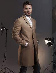 Notch lapels, decorative buttons at cuffs, and vent at back. Pin On Mens Fashion