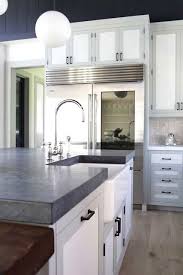 Kitchen Island With Grey Soapstone Counters And White Cabinets Light Grey Kitchen Cabinets Light Grey Kitchens Grey Kitchen Cabinets
