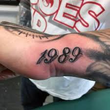 Guy With Side Hand Numbers 1989 Tattoo Design Side Hand Tattoos Number Tattoos Tattoos For Guys