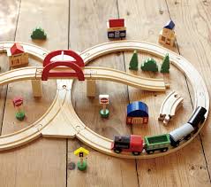 The 50 pieces include a suspension bridge and a track map layout. Wooden Train Set Pottery Barn Kids