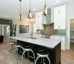 Ww Wood Products Aspect Cabinetry White Perimeter With Bistre Stain Island Quartz Countertops Caesar Caesarstone Raw Concrete Countertops Quartz Countertops