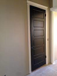 Black interior doors draw the eye upward and give the illusion of a taller ceiling height. For Entryway Back Of Front Door Black Is Sherwin Williams Tricorn Black In Semi Gloss Wall Color Is Sh Interior Door Colors Black Interior Doors Door Color