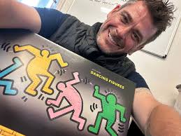 Teasing about hat that can hold drink