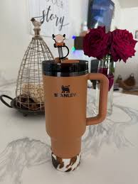 Stanley cup with cow theme and toppers