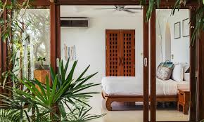 A perfect blend of wild colors, over the top accents and details. Tropical Style Interior Design