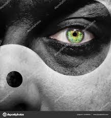 Yin yang face with green eye Stock Photo by ©SemmickPhoto 131435330